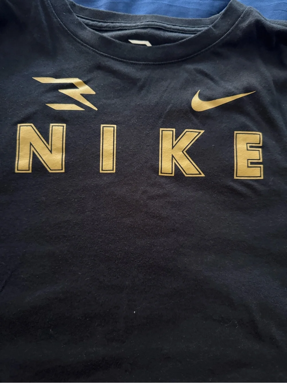 Nike Youth Black Long Sleeve Shirt with Gold Lettering